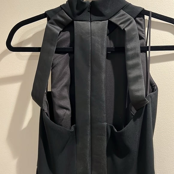 Black jumpsuit with pockets and cut out back - Picture 4 of 4